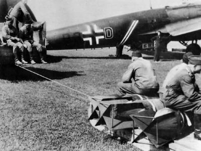 German Crew Hauling Bombs to Heinkel He 111 of KG 54 Totenkopf 1940