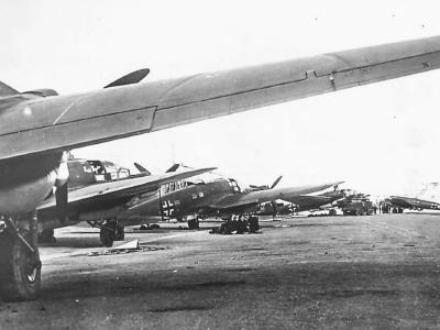 Line of German Heinkel He 111 of KG 26 on airfield in Italy 1941