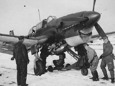 Luftwaffe mechanics prepare a Junkers Ju87 B of StG 2 for an operational sortie