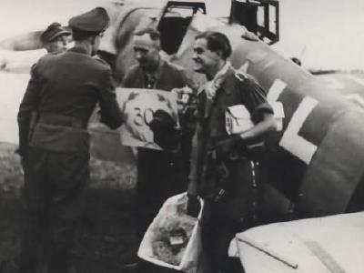 Oberleutnant Gottfried Hagena and his Bf109G-6 after completing his 300th operational mission, 1944