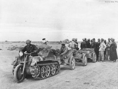 Italian soldiers ride SdKfz 2 to surrender to British in Egypt ’42