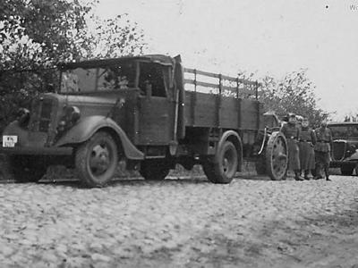 Ford V8-51 trucks towing artillery