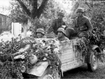 Fallschirmjagers riding Kübelwagen, France 1944