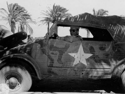 Senator James A. Mead in captured Kubelwagen Tunisia 1944