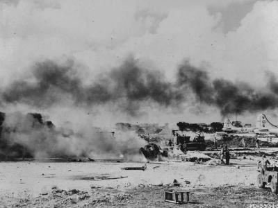 B-29 burning at Isley Field Japanese Strike Back On Saipan 27 November 1944