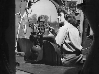 WAC in B-29 waist gunner Guam 1945