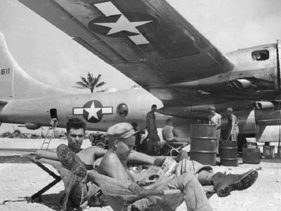 soldiers Rest Under Wing of Boeing B-29 at Marianas Base