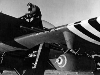 French pilot lt George Gauthier flying with First Tactical AF climbs into his P-47D Bubbletop