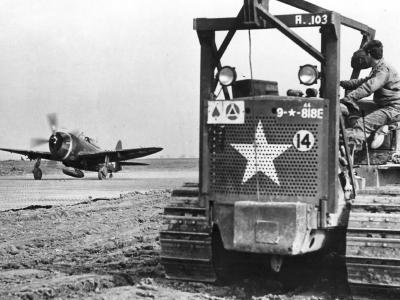 Taxing P-47 Thunderbolt of the 9th AF and Caterpillar D7 Tractor (818th Engineer Aviation Battalion) – France 1944
