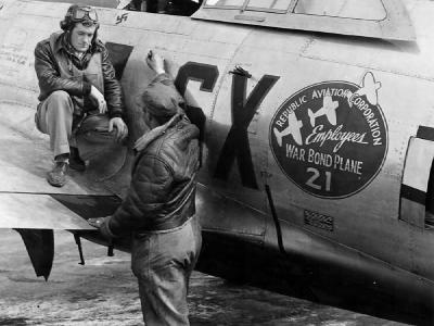 Lt Donald J. Corrigan of the 352nd FS, 353rd FG with his crew chief and P-47D 42-25771, code SX I