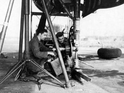 Clean And Fix The Brake On A Northrop P-61 Black Widow of the 9th AF France 27 September 1944