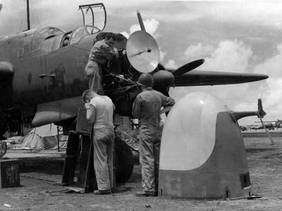 Maintenance of the SCR 720 radar system on a P-61A of the 6th NFS Saipan