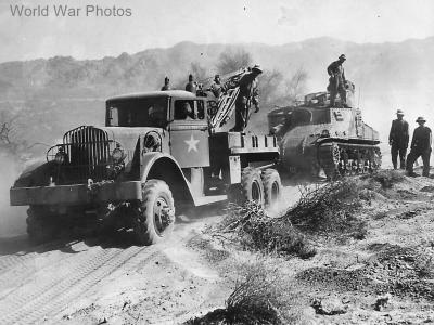 Ward LaFrance Model 1000 Series 2 WSU-626 wrecker preparing to tow an M3 Lee tank somewhere in Africa
