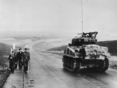 1st Army M4 Sherman Tank Passes Surrendering Germans at Kassel 1945