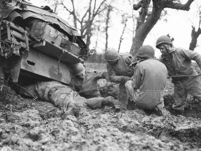 9th Army Troops Rescue M4 Sherman Tank from Mud 1944