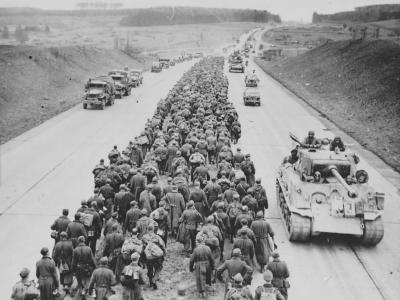 German Prisioners (Autobahn near Giesen) and M4A3E8 Sherman, March 29, 1945