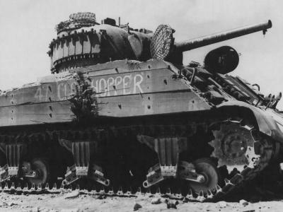 Knocked out M4A3 Sherman Clodhopper with wooden side armor, of the C Company 4th tank battalion – Iwo Jima March 1945
