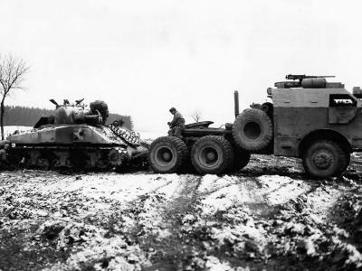 M26 Dragon Wagon of 4th Armored Division Hauls destroyed M4 Sherman near Bastogne Belgium