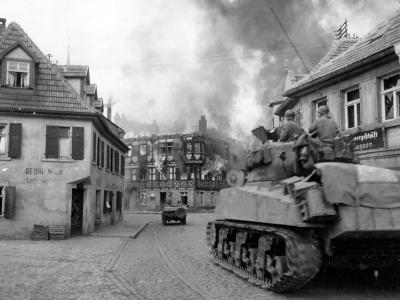 M4 Sherman of the 11th Armored division advance into Kronach Germany April 1945
