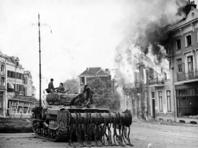 M4 Sherman Flail Tank Moves Up Through The Blazing Town Arnhem 1945