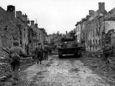Soldiers And M4 Sherman Tank March Through Normandy St Fromond July 1944