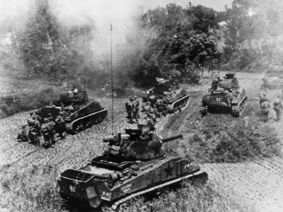 Troops and M4 Sherman tanks of 10th Army advancing on Okinawa
