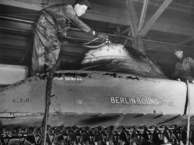 Workmen give final coat of paint to M4 Sherman named Berlin Bound at the Chester Tank Depot 1943