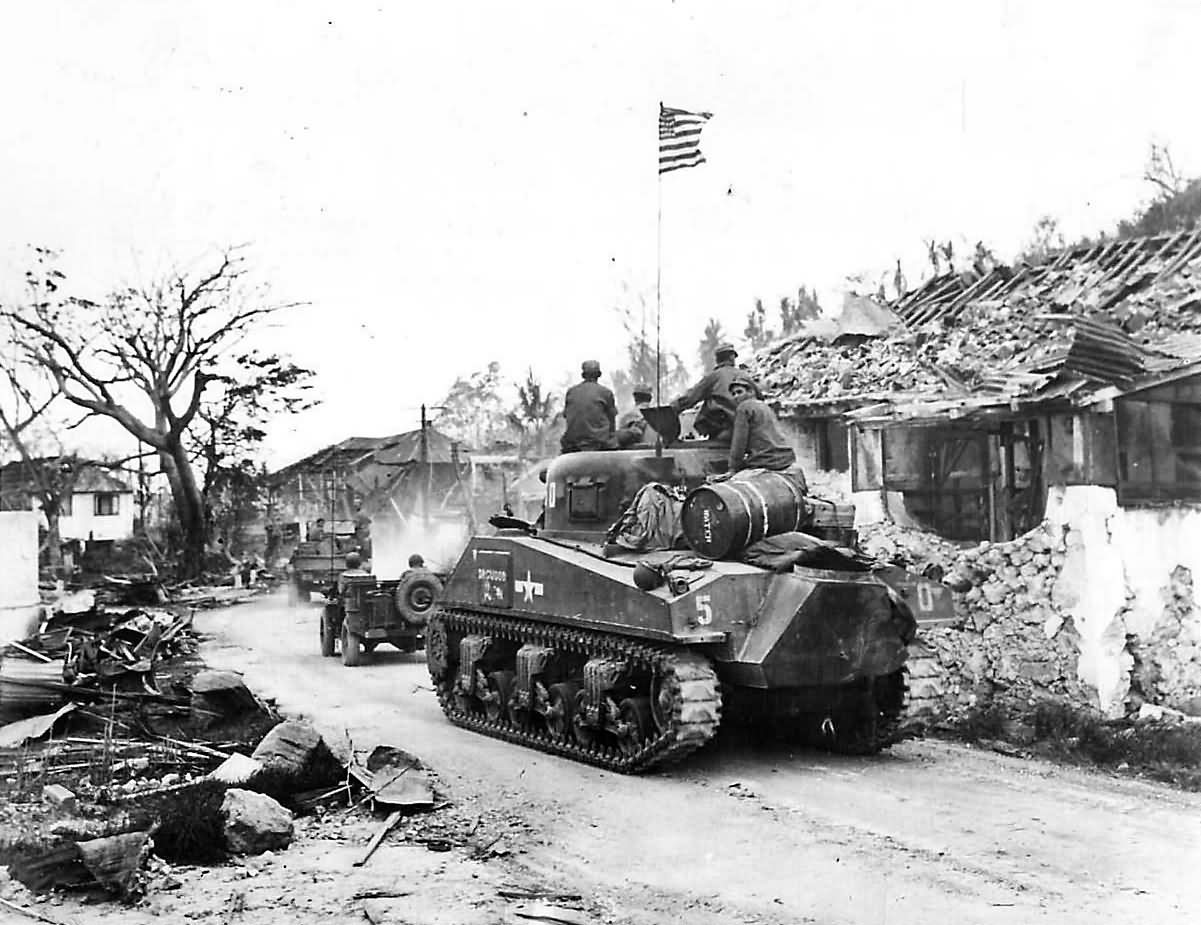 3rd Marine Division Troops and M4 Sherman Tank Moves thru Agana Guam