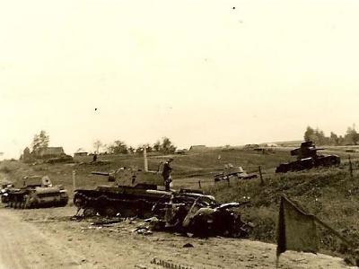 KV-1 T-26 T-34 destroyed tanks on Road