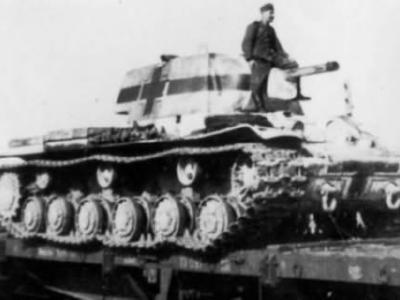 German KV-1 with balkenkreuz on flatcar – winter camo