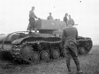 Soviet heavy tank KV-1 19 and Wehrmacht soldiers