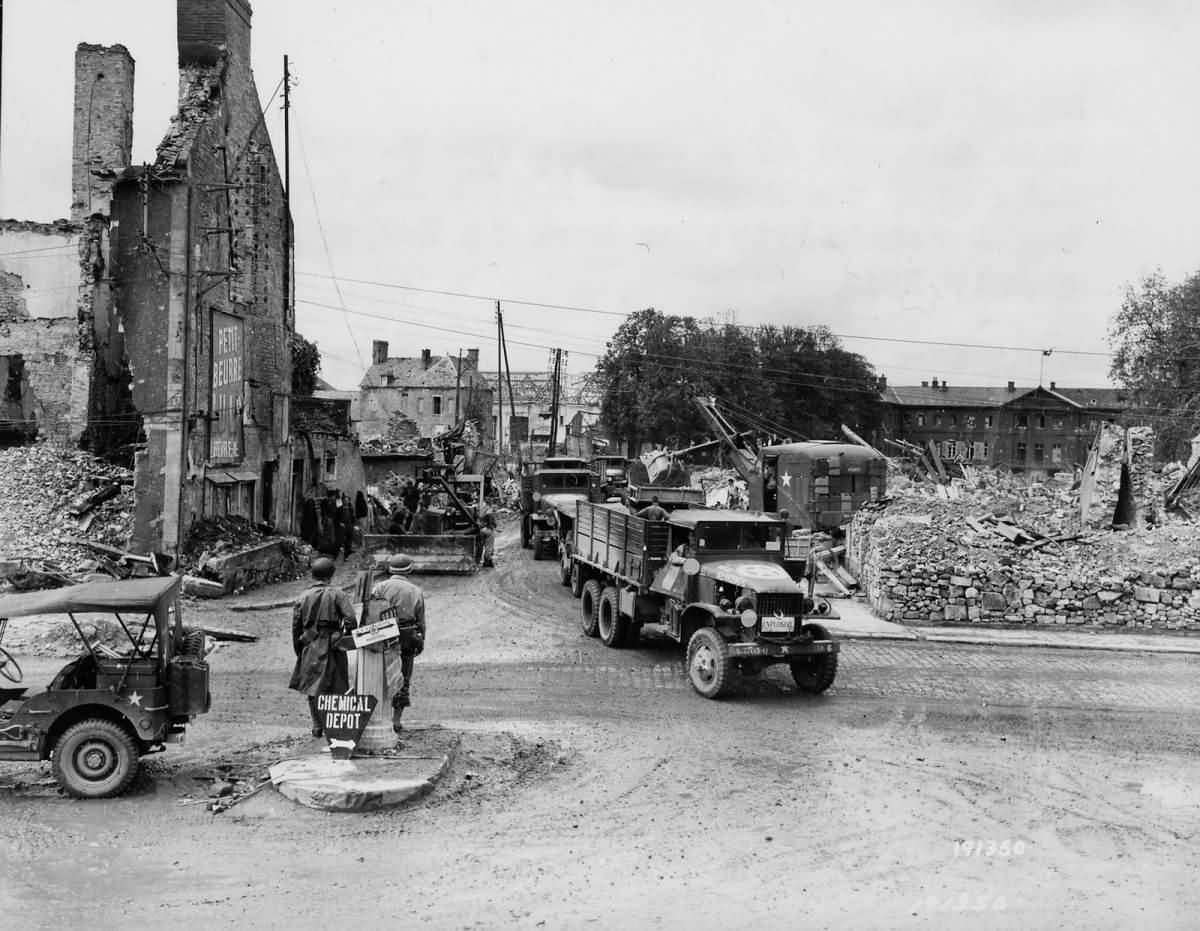 1055th Engineers Clear Rubble in Isigny France with Gas Shovel Trucks Dozer