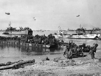 111th Naval Construction Battalion Landing at Omaha Beach D-Day Normandy 1944. LCT-562 and USS LST-502 in the background