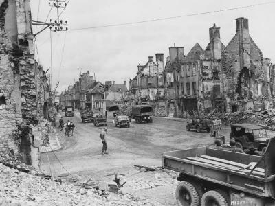 1st Army Trucks and Jeeps in Ruins of Isigny Normandy 1944