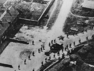 American soldiers file thru St. Jacques De Nehou enroute to Barneville and Carteret Normandy