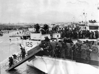 Canadaian bicycle Troops land at Juno s Nan White Beach on D-Day