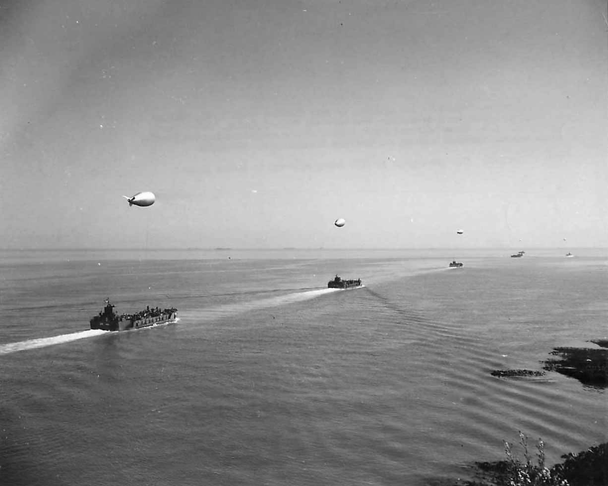 Convoy of LCTs and barrage balloons preparing for D-Day Invasion