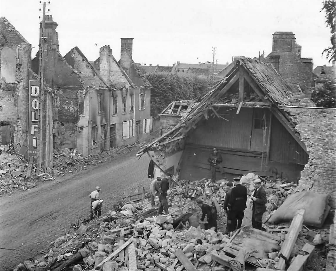 French Civilians and Firemen Start Reconstruction in Carentan Normandy 1944