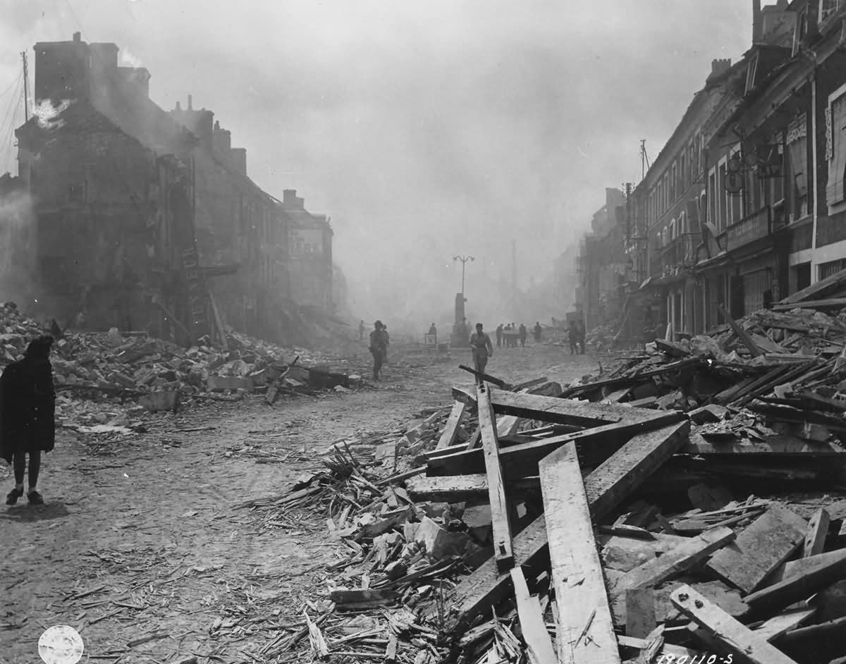 GIs in main street of Isigny June 11 1944 France 1944 Normandy