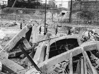German prisoners marched past ruins on outskirts of Caen