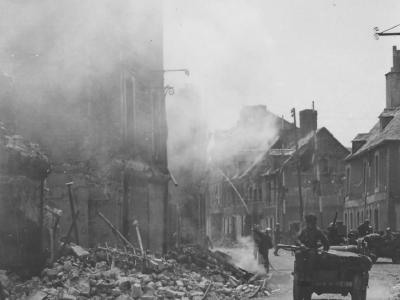 Photo Fireman Put Out Fire in Carentan Normandy France 1944