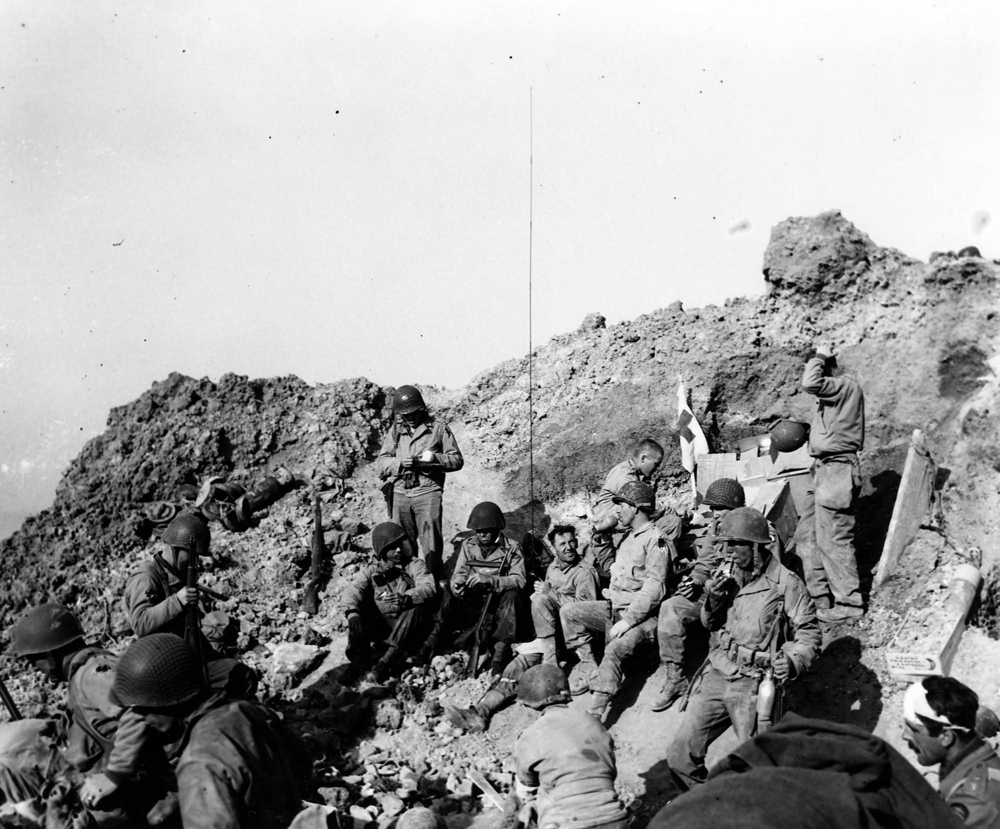 Rangers rest atop the cliffs at Pointe du Hoc 6 June 1944