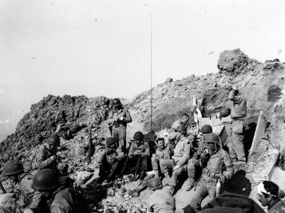Rangers rest atop the cliffs at Pointe du Hoc 6 June 1944