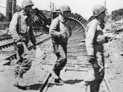 Soldiers of 327th Glider Infantry Regiment amid Ruins of Carentan 1944 Normandy