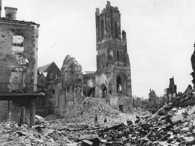 Soldiers view ruins of Notre Dame Cathedral in St. Lo Normandy