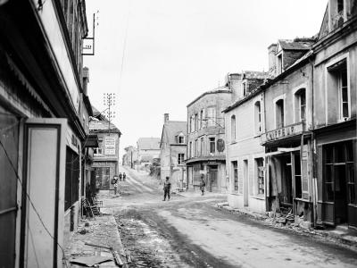 Street scene in St. Mere Eglise after its capture by the US Army 10 June 1944