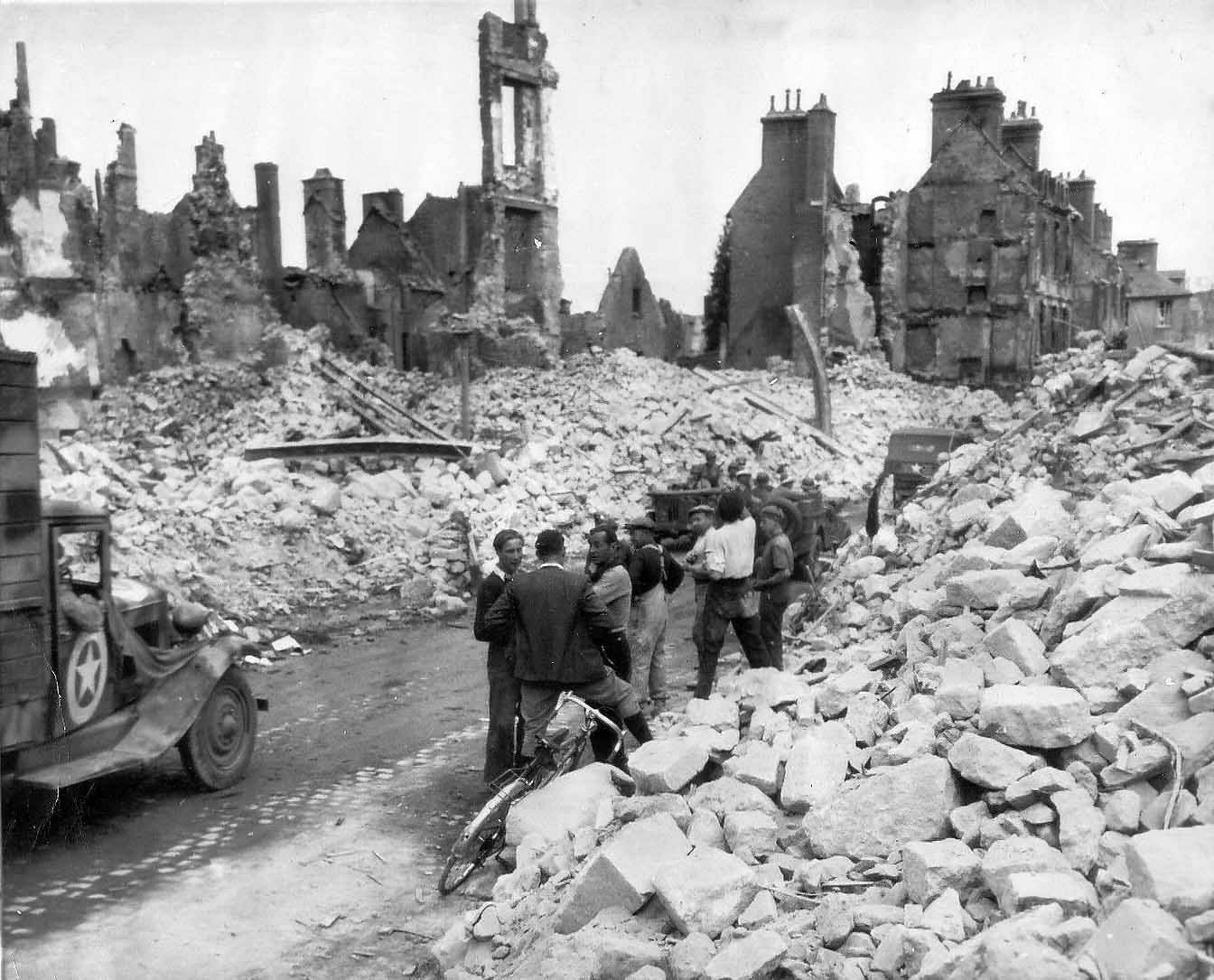Truck in bombed ruins of Valognes