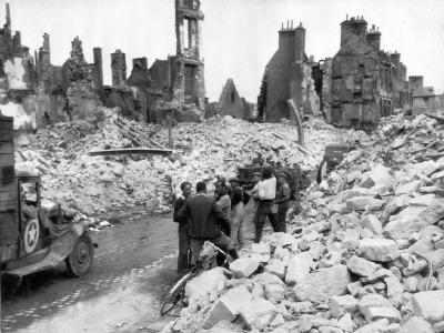Truck in bombed ruins of Valognes