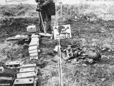 US Army Soldier in German Mine Field in Normandy France 1944