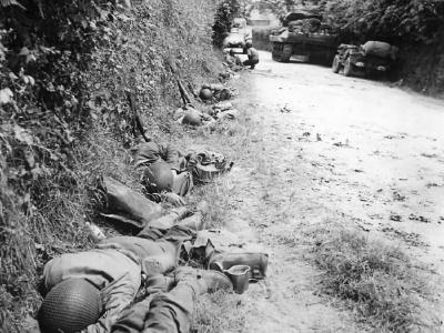 US Army Troops Rest in Ditch During Advance on Cherbourg June 1944 Normandy